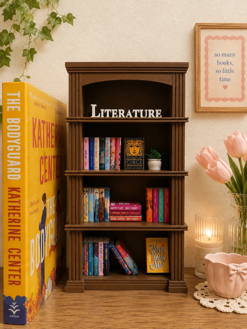 The Choco Brown Classic bookshelf styled with a LITERATURE topper, tulips and candlelight, beside a full-size novel